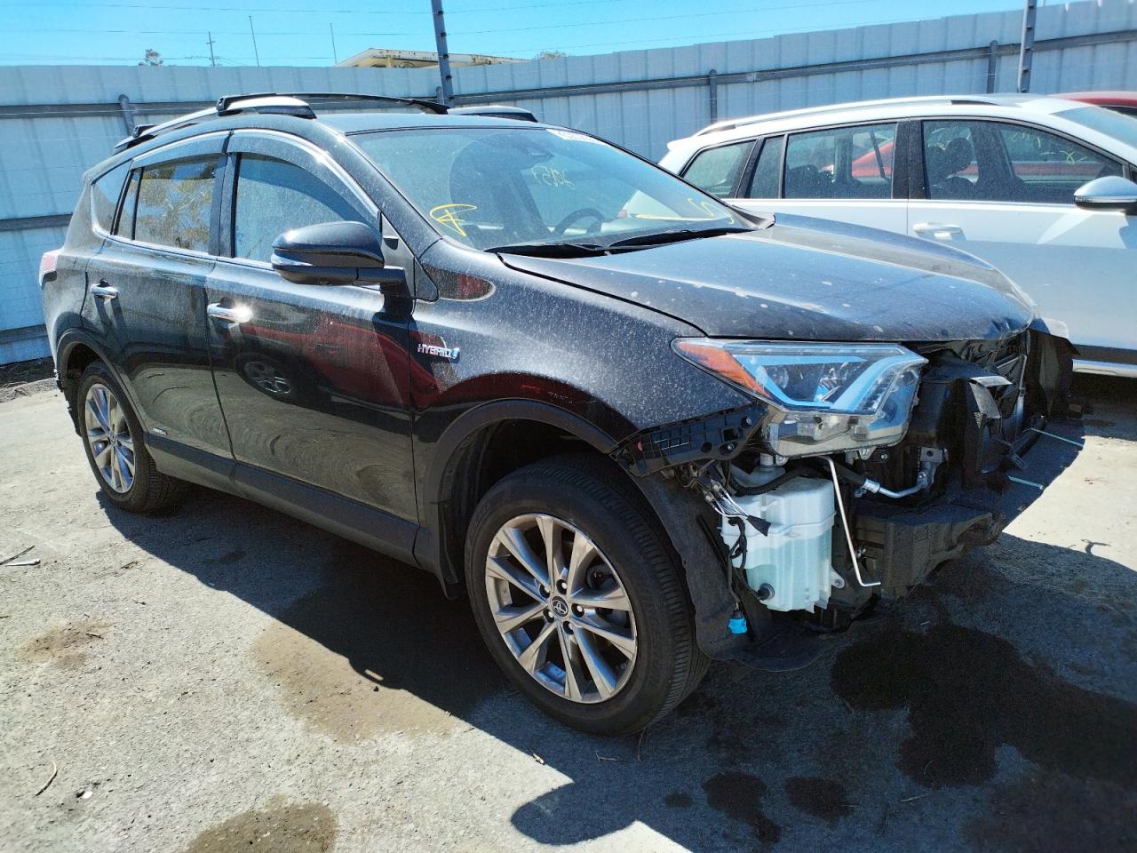 TOYOTA RAV4 HV LI 2018 with VIN JTMDJREV2JD210228 - Photo from auction