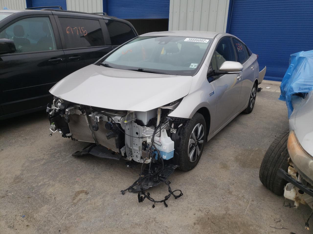 Photo 2 from auction – 2018 TOYOTA PRIUS PRIM with VIN JTDKARFP4J3097265