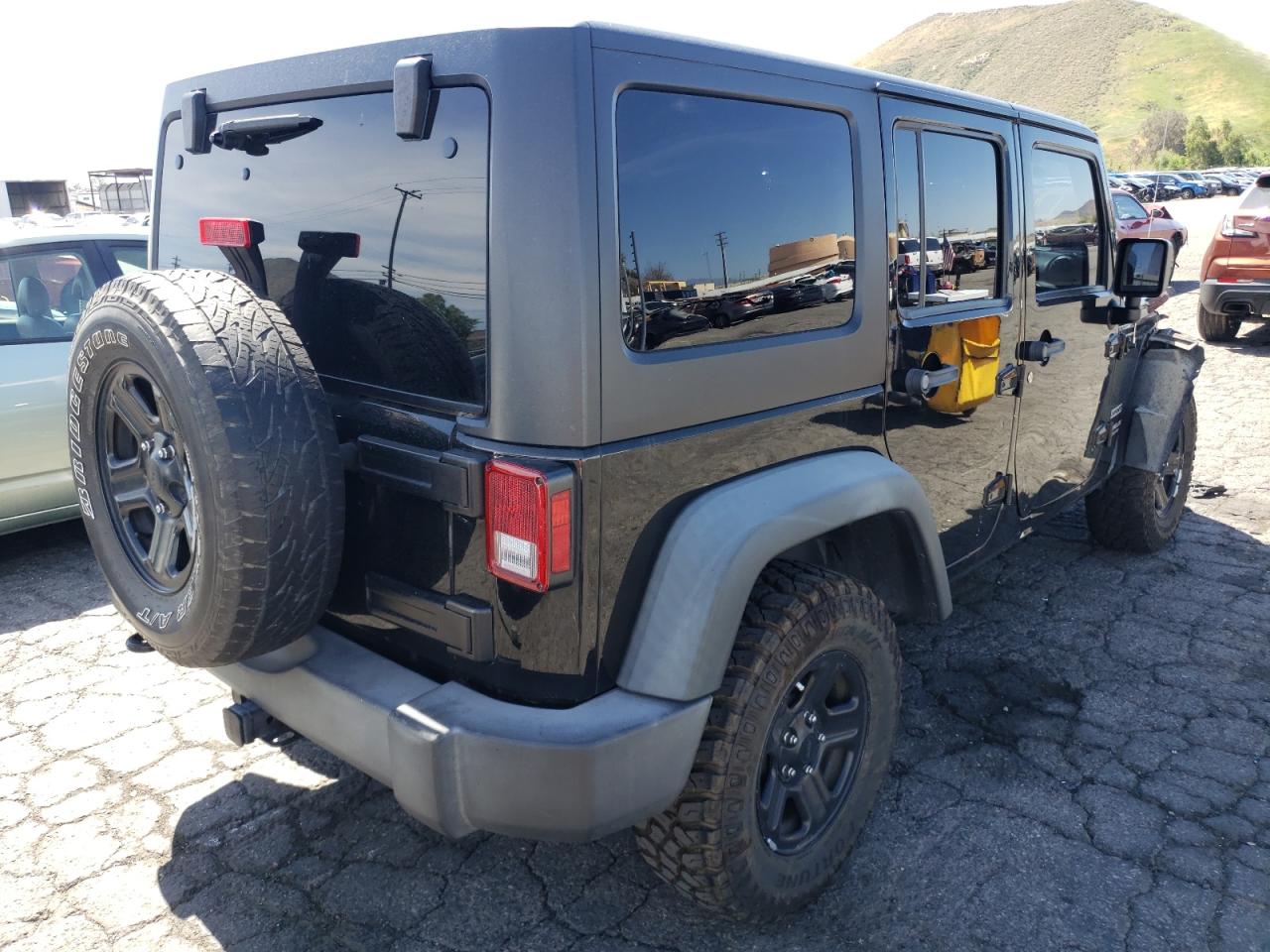 Photo 4 from auction – 2016 JEEP WRANGLER U with VIN 1C4BJWDG0GL323568