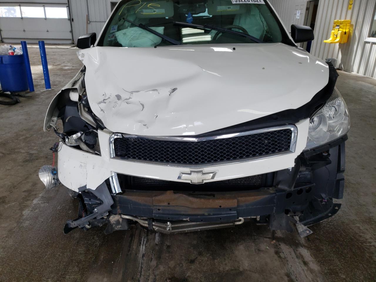 Photo 7 from auction – 2012 CHEVROLET TRAVERSE L with VIN 1GNKRFED1CJ398533