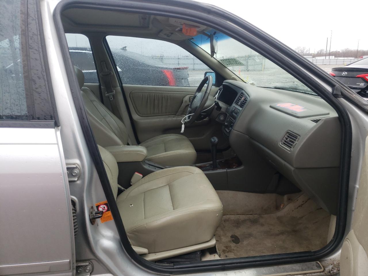 Photo 5 from auction – 2002 INFINITI G20 with VIN JNKCP11A22T509710