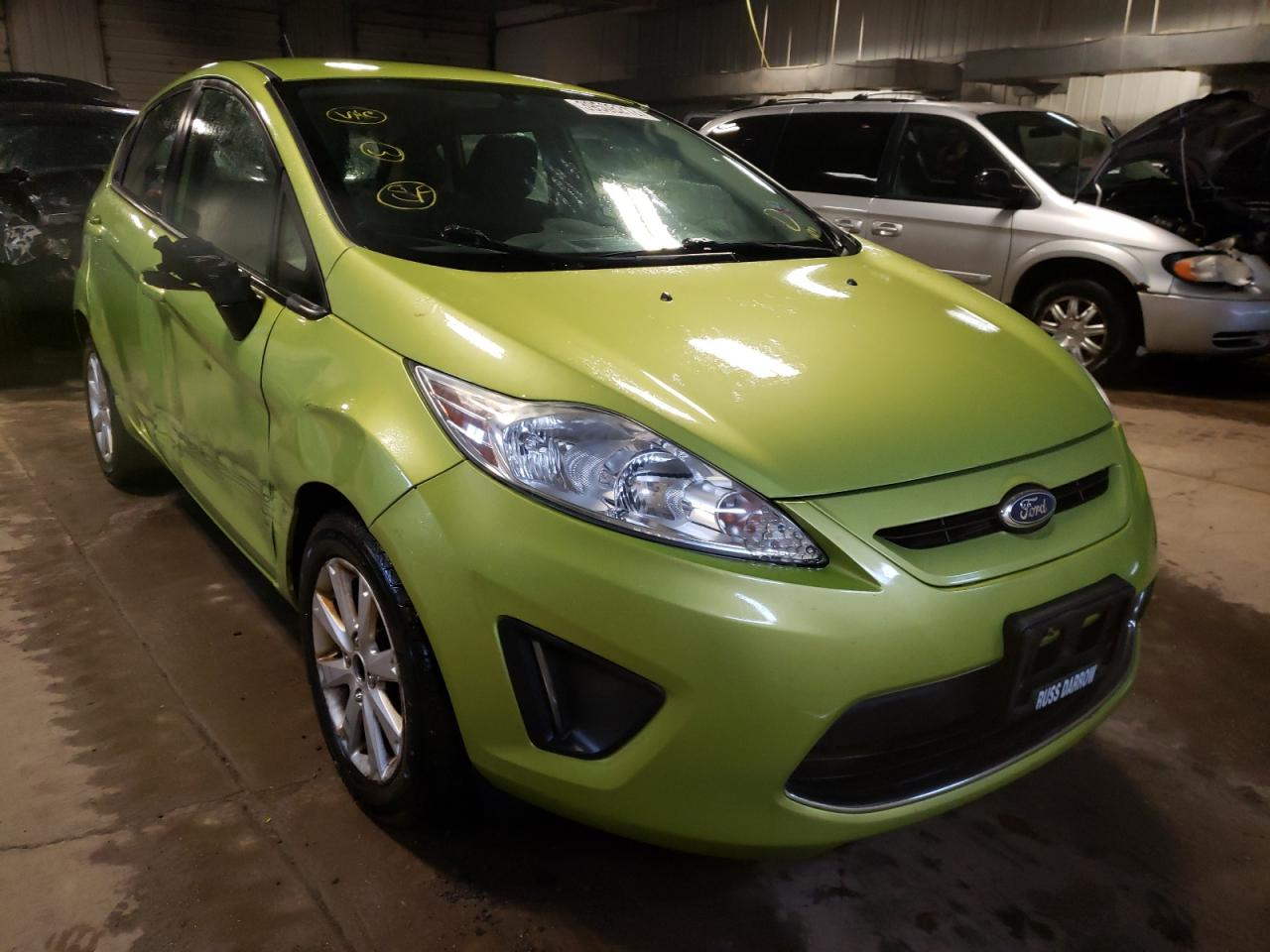 FORD FIESTA SE 2011 with VIN 3FADP4EJ6BM166115 - Photo from auction