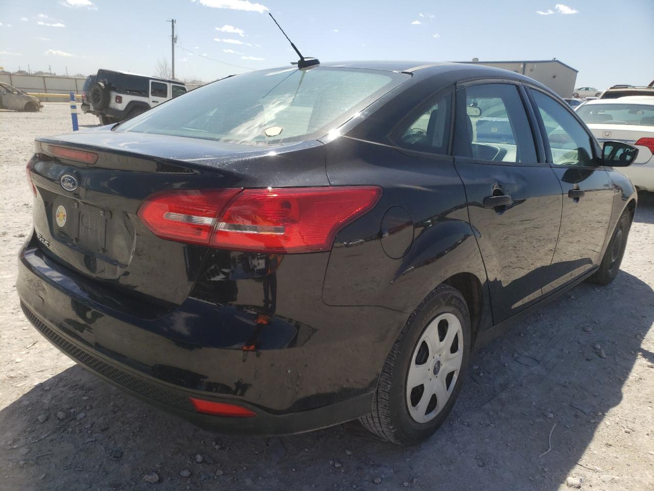Photo 4 from auction – 2017 FORD FOCUS S with VIN 1FADP3E21HL214214