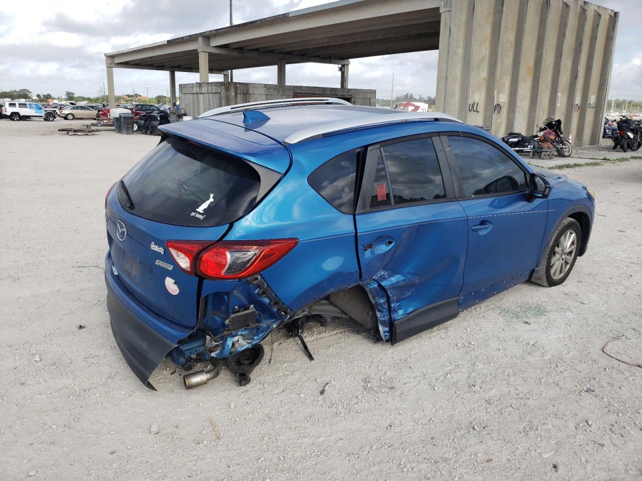 Photo 4 from auction – 2014 MAZDA CX-5 TOURI with VIN JM3KE2CY1E0320112