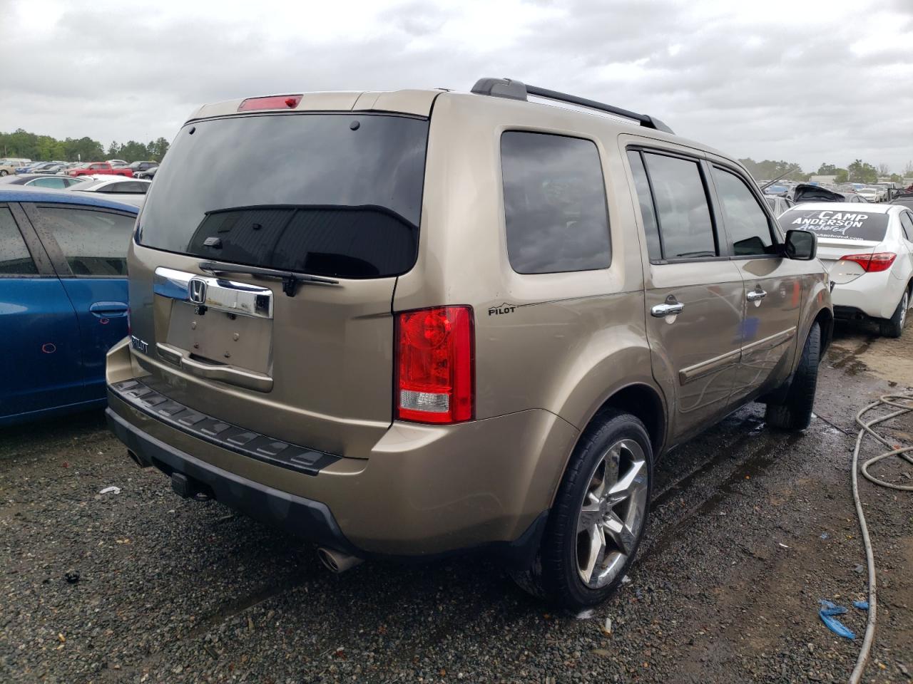 Photo 4 from auction – 2011 HONDA PILOT EX with VIN 5FNYF3H42BB057007