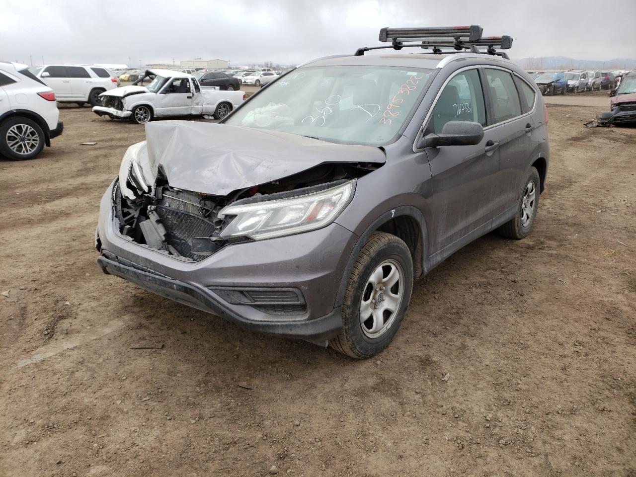 Photo 2 from auction – 2015 HONDA CR-V LX with VIN 5J6RM4H35FL030209