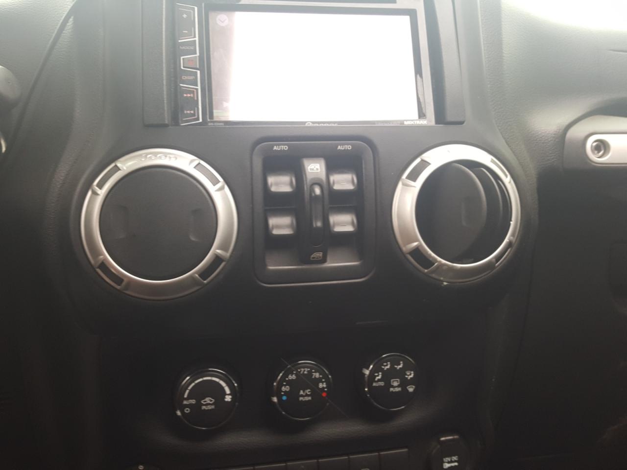 Photo 9 from auction – 2011 JEEP WRANGLER U with VIN 1J4BA5H11BL632744