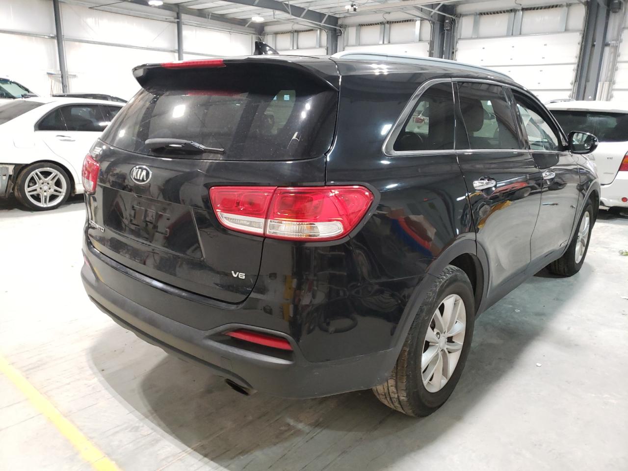 Photo 4 from auction – 2016 KIA SORENTO LX with VIN 5XYPGDA50GG009894