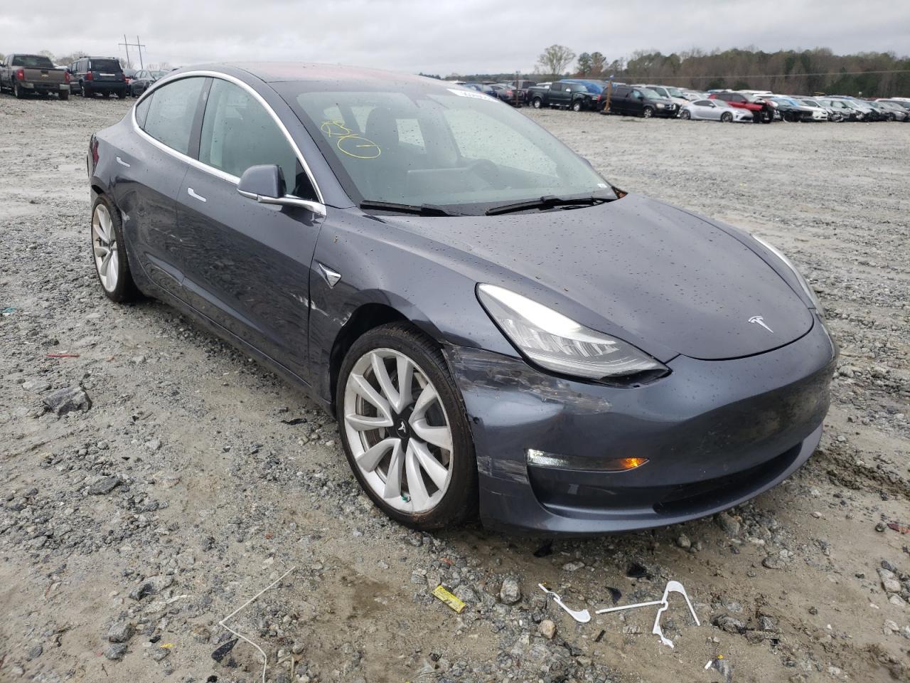 TESLA MODEL 3 2018 with VIN 5YJ3E1EA3JF010899 - Photo from auction
