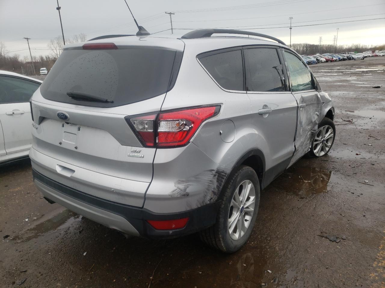 Photo 4 from auction – 2018 FORD ESCAPE SE with VIN 1FMCU0GDXJUC31522