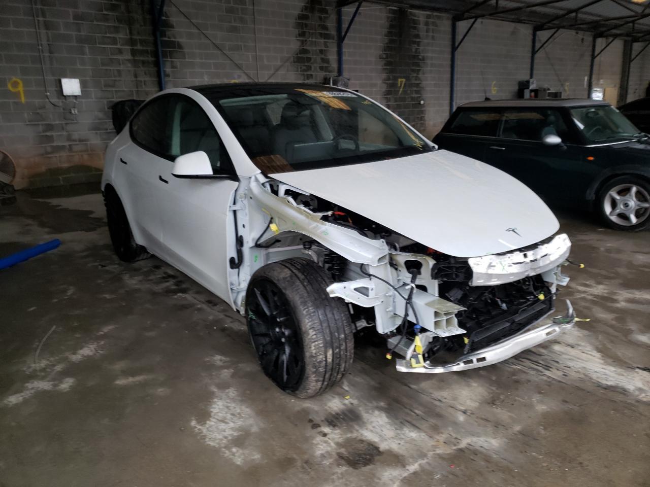 TESLA MODEL Y 2021 with VIN 5YJYGAEE5MF296441 - Photo from auction