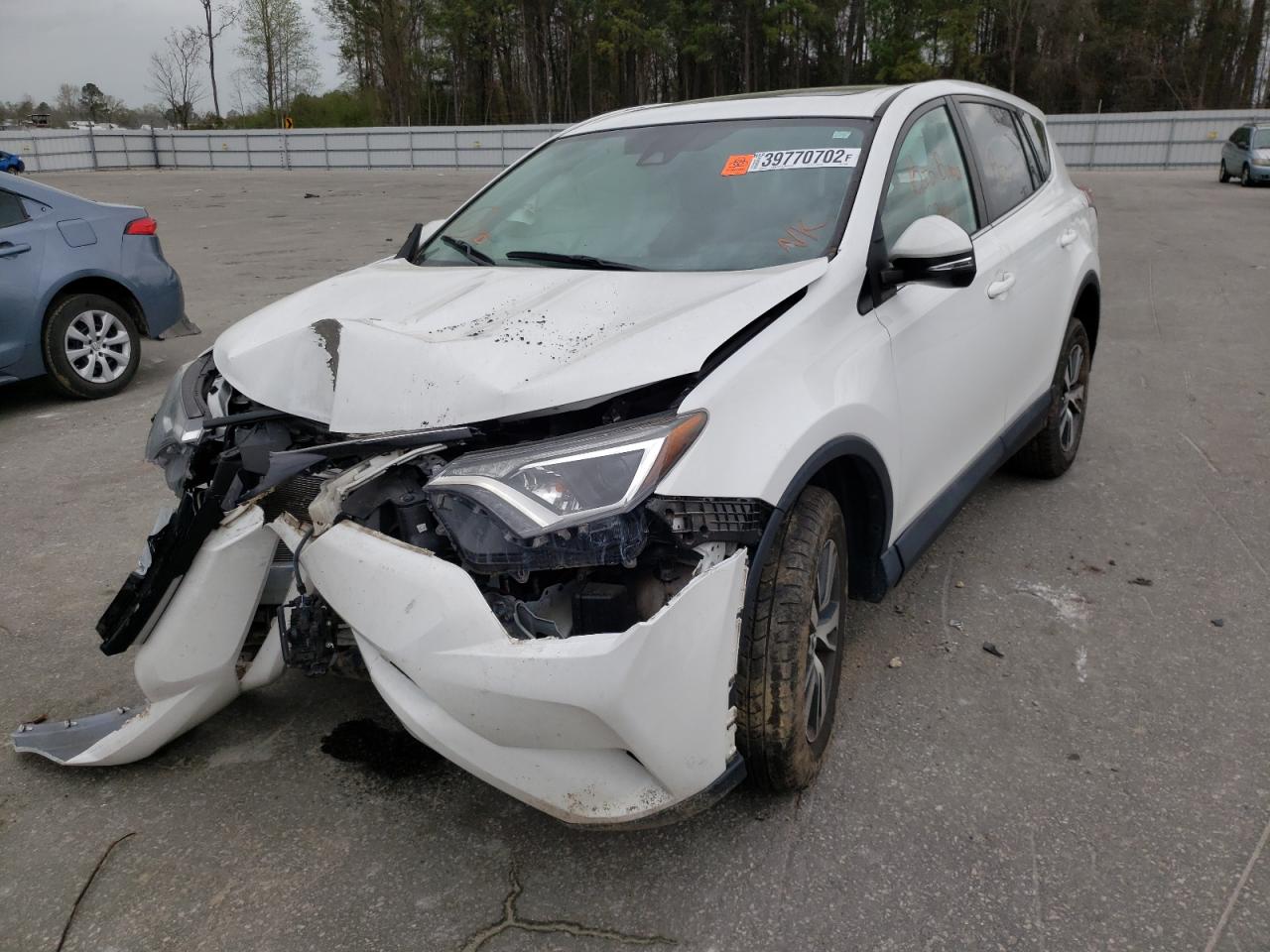 Photo 2 from auction – 2018 TOYOTA RAV4 ADVEN with VIN 2T3RFREV6JW773390