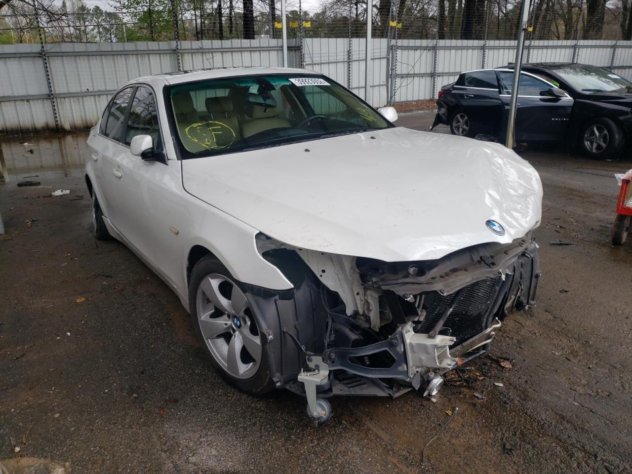 BMW 530 I 2007 with VIN WBANE73547CM48612 - Photo from auction