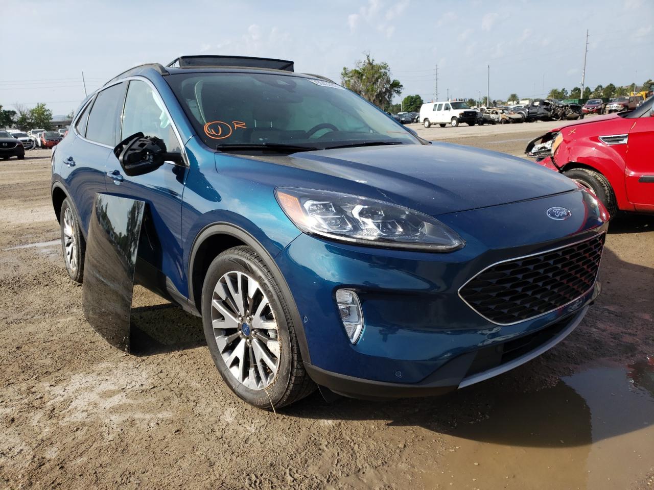 FORD ESCAPE TIT 2020 with VIN 1FMCU0DZ2LUA93879 - Photo from auction