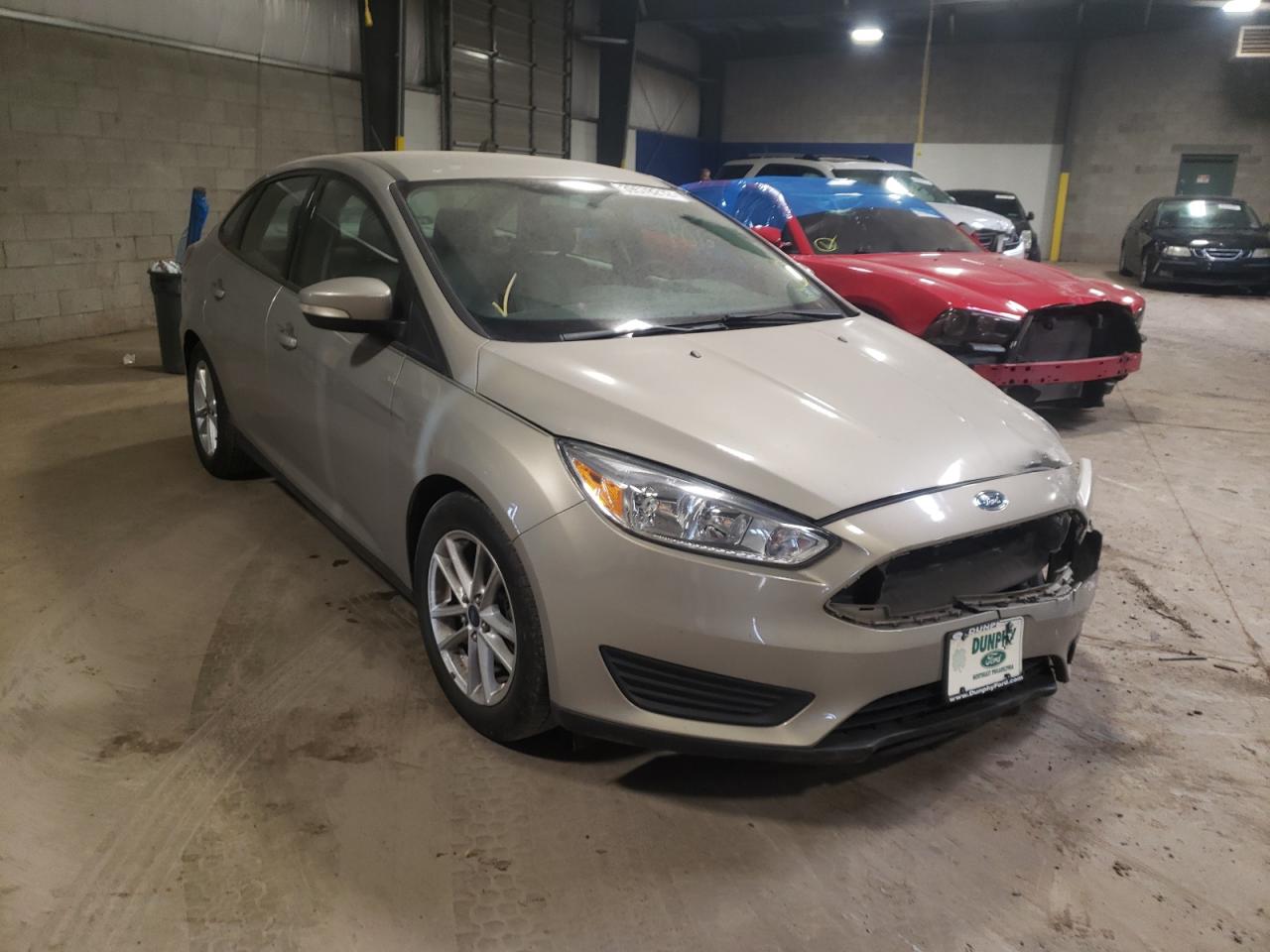 FORD FOCUS SE 2015 with VIN 1FADP3F29FL303976 - Photo from auction