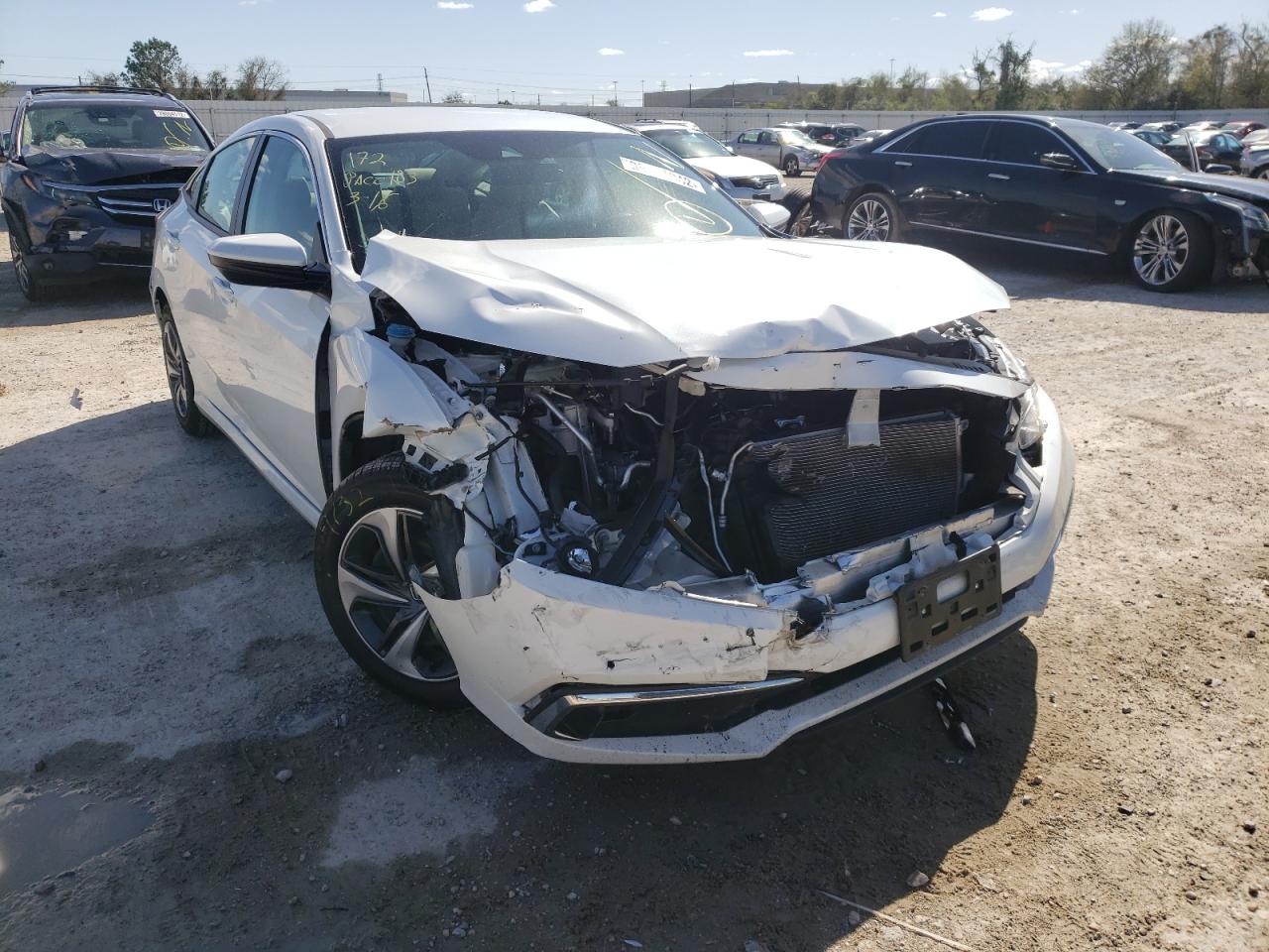 HONDA CIVIC LX 2019 with VIN 19XFC2F69KE046977 - Photo from auction