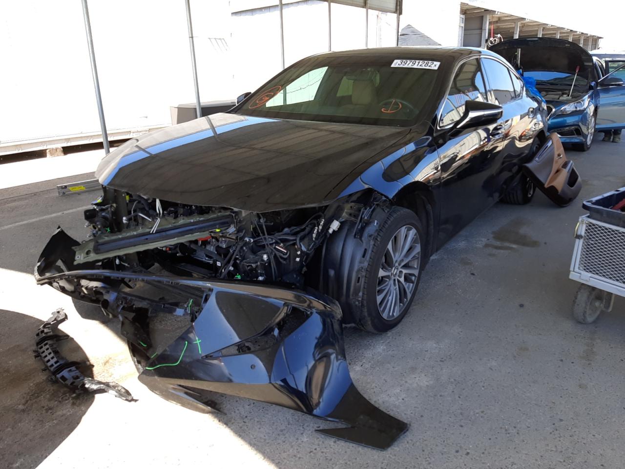Photo 2 from auction – 2021 LEXUS ES 300H with VIN 58ADA1C14MU008551