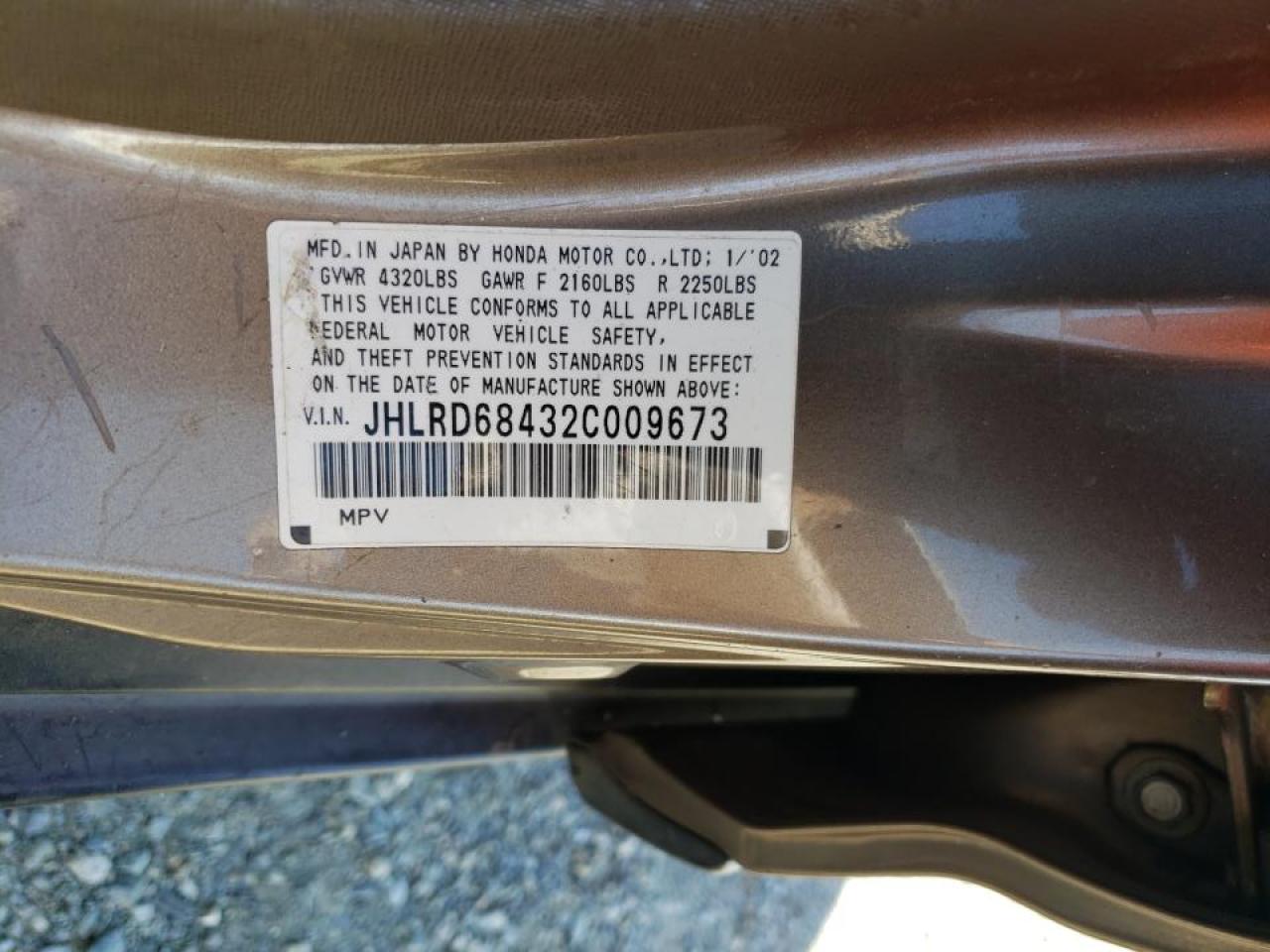 Photo 10 from auction – 2002 HONDA CR-V LX with VIN JHLRD68432C009673