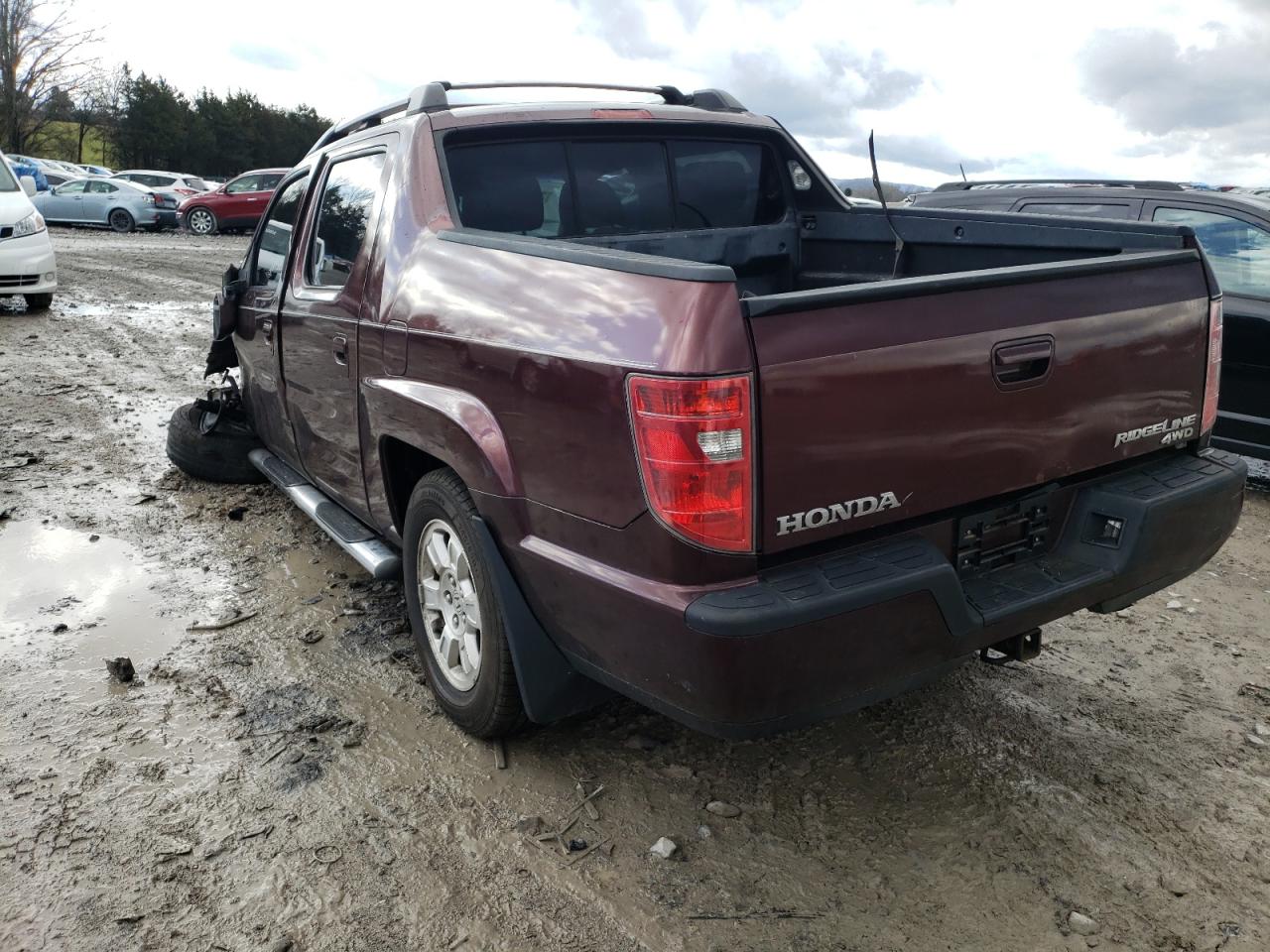 Photo 3 from auction – 2010 HONDA RIDGELINE with VIN 5FPYK1F41AB002508