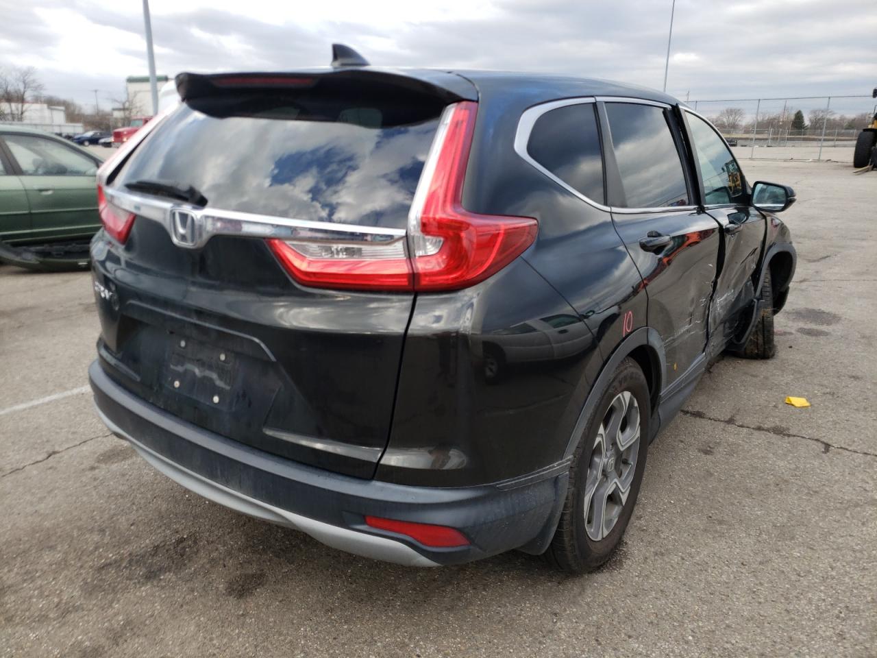 Photo 4 from auction – 2017 HONDA CR-V EX with VIN 7FARW1H55HE031435