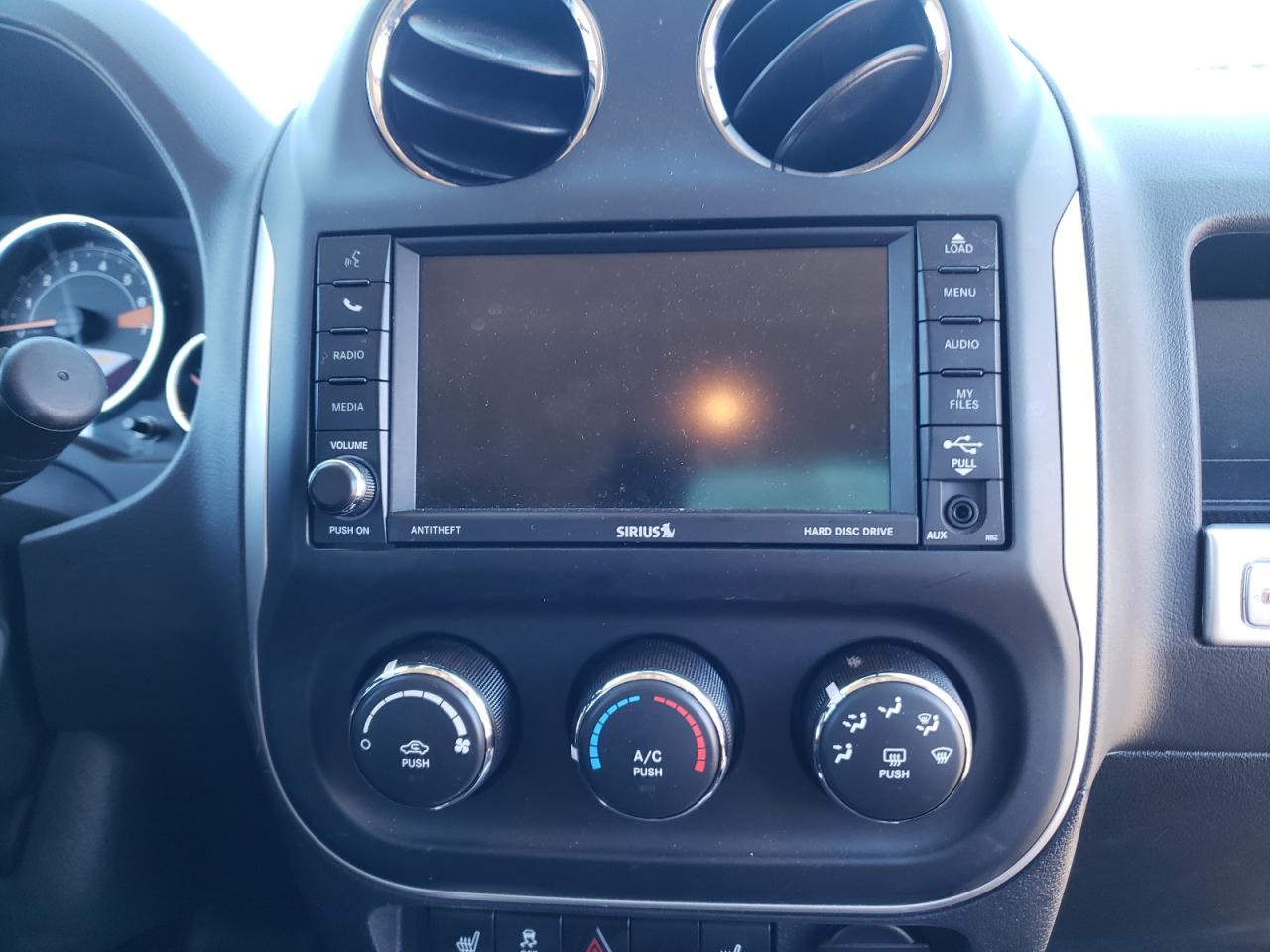 Photo 9 from auction – 2016 JEEP COMPASS LA with VIN 1C4NJDEB0GD588148