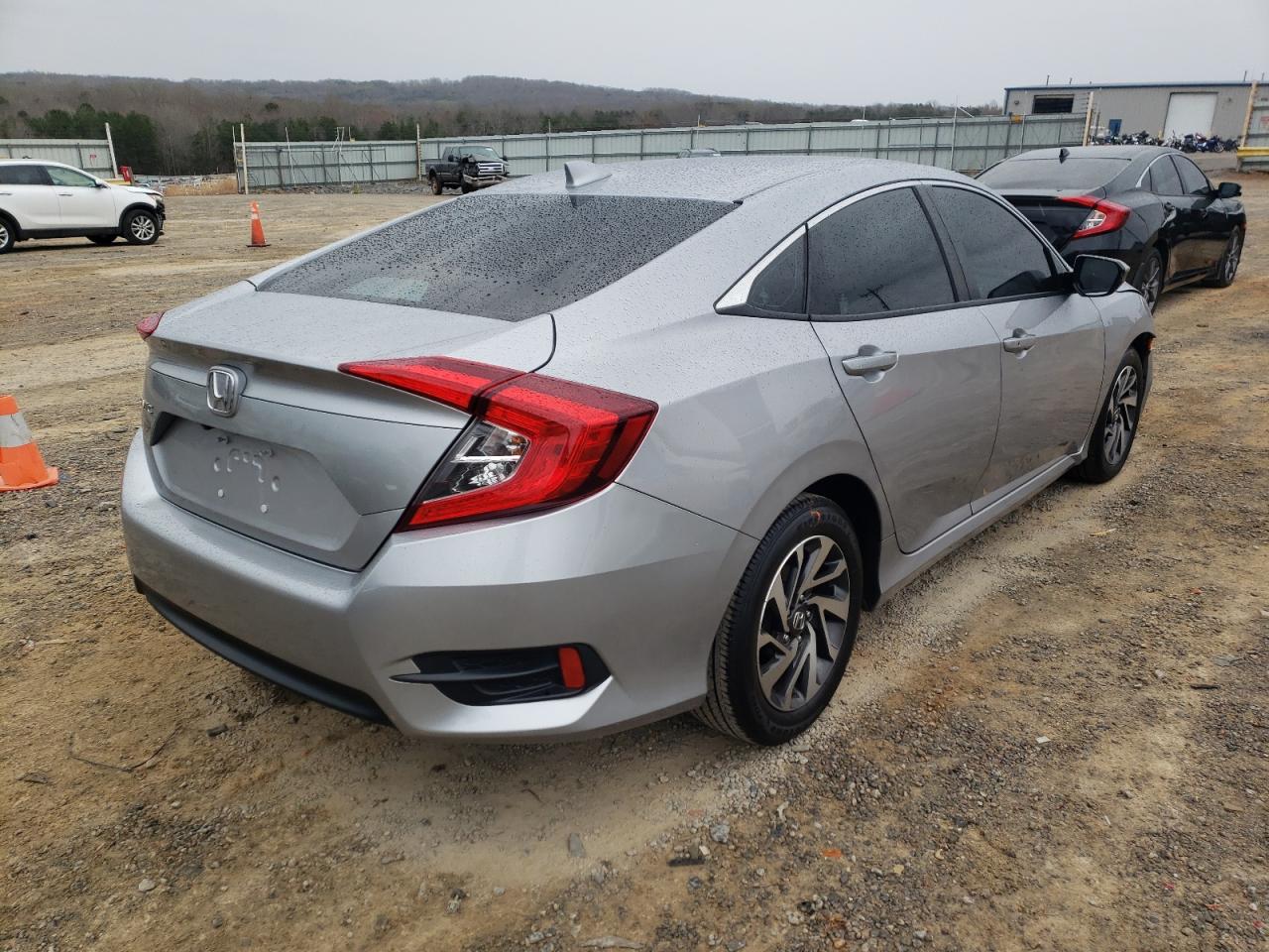 Photo 4 from auction – 2018 HONDA CIVIC EX with VIN 19XFC2F77JE026864