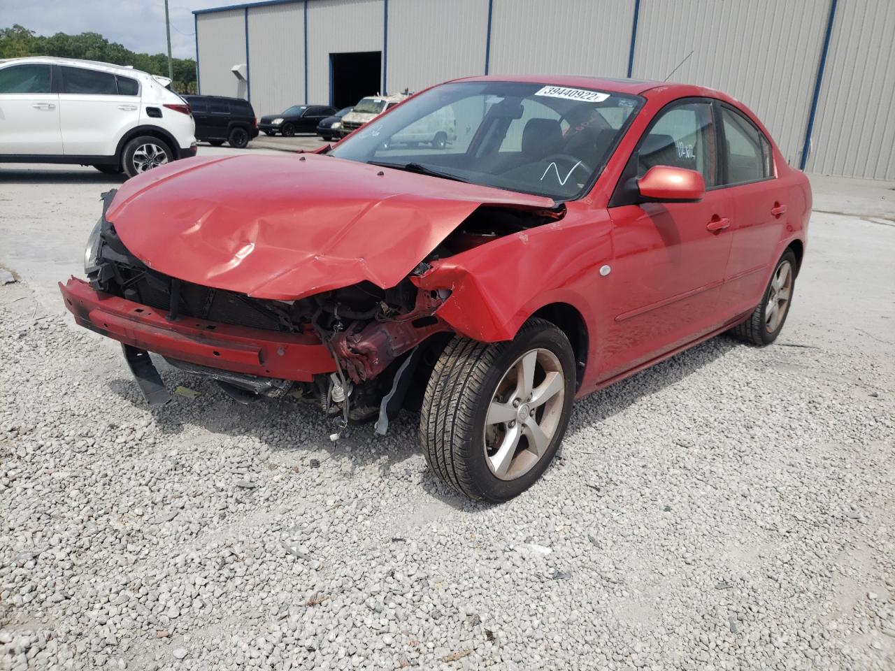 Photo 2 from auction – 2004 MAZDA 3 I with VIN JM1BK12FX41195583