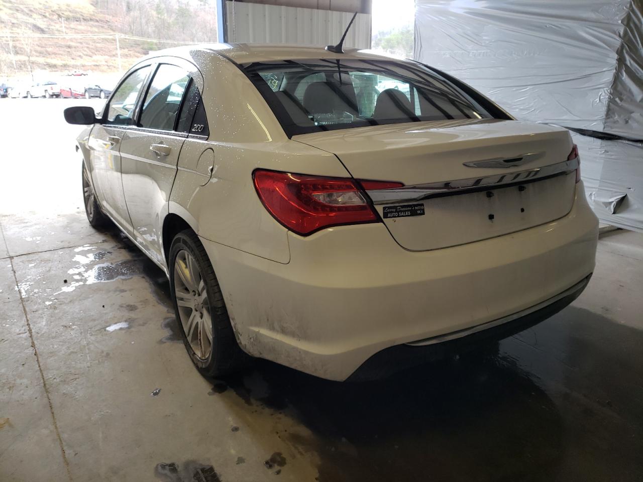 Photo 3 from auction – 2013 CHRYSLER 200 LX with VIN 1C3CCBAB9DN685869