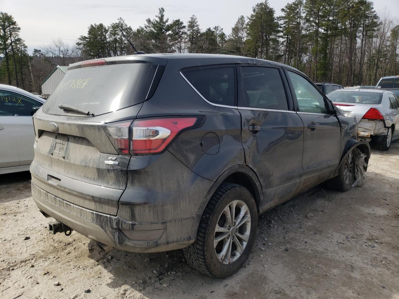 Photo 4 from auction – 2017 FORD ESCAPE SE with VIN 1FMCU9G98HUD90078