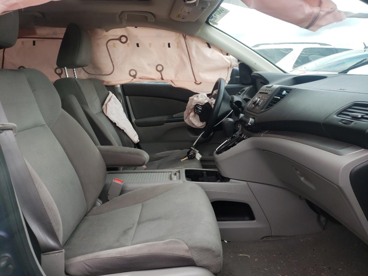 Photo 5 from auction – 2012 HONDA CR-V EX with VIN 3CZRM3H55CG701866