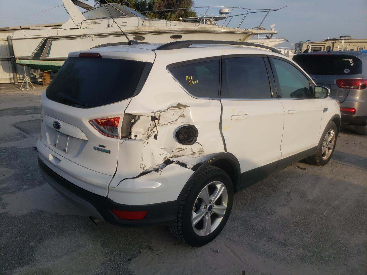 Photo 4 from auction – 2016 FORD ESCAPE SE with VIN 1FMCU0GX2GUB31353