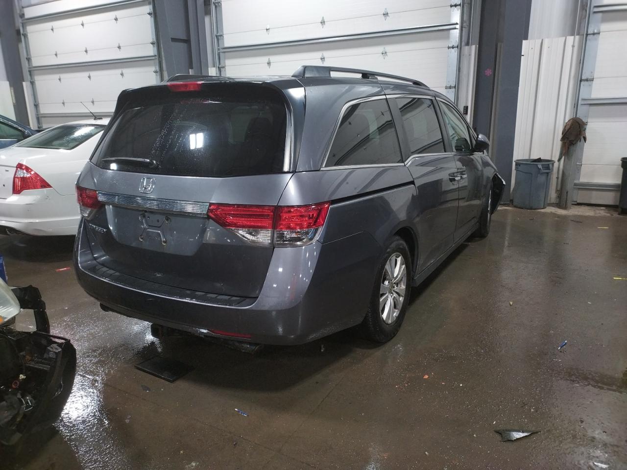 Photo 4 from auction – 2014 HONDA ODYSSEY EX with VIN 5FNRL5H40EB026772