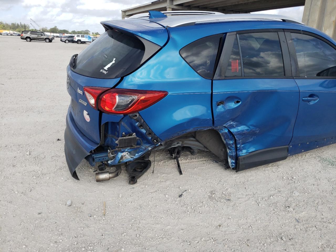 Photo 9 from auction – 2014 MAZDA CX-5 TOURI with VIN JM3KE2CY1E0320112
