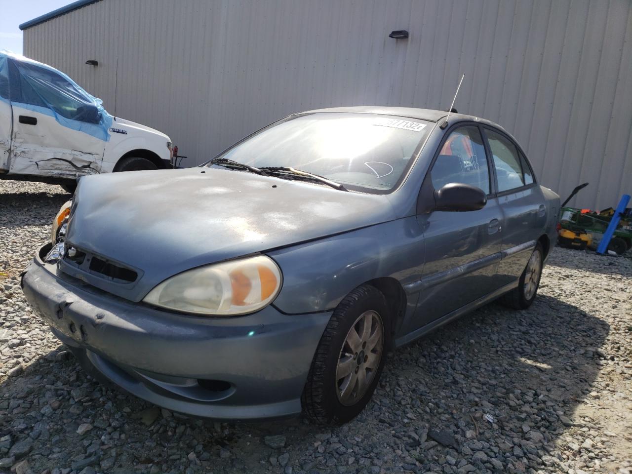 Photo 2 from auction – 2002 KIA RIO with VIN KNADC123X26097727