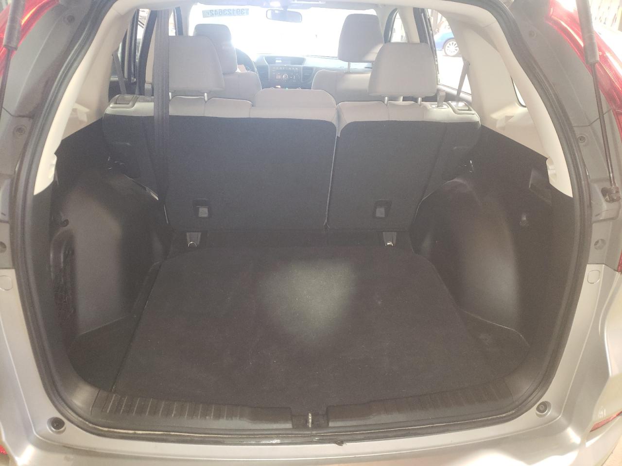 Photo 9 from auction – 2016 HONDA CR-V LX with VIN 5J6RM4H33GL116345