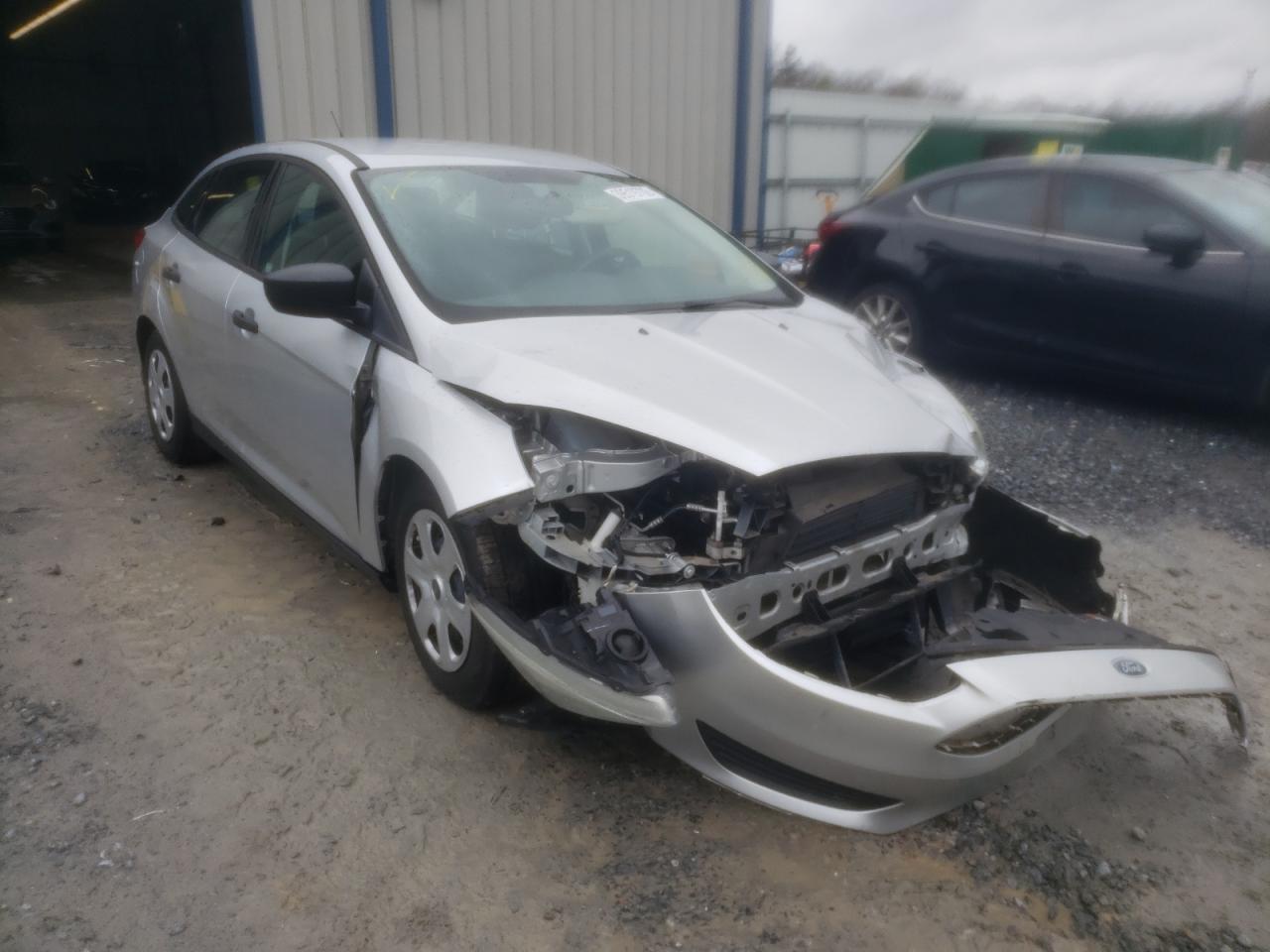 FORD FOCUS S 2015 with VIN 1FADP3E20FL311269 - Photo from auction