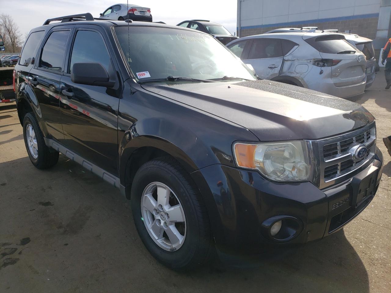 FORD ESCAPE XLT 2010 with VIN 1FMCU0D78AKD04705 - Photo from auction