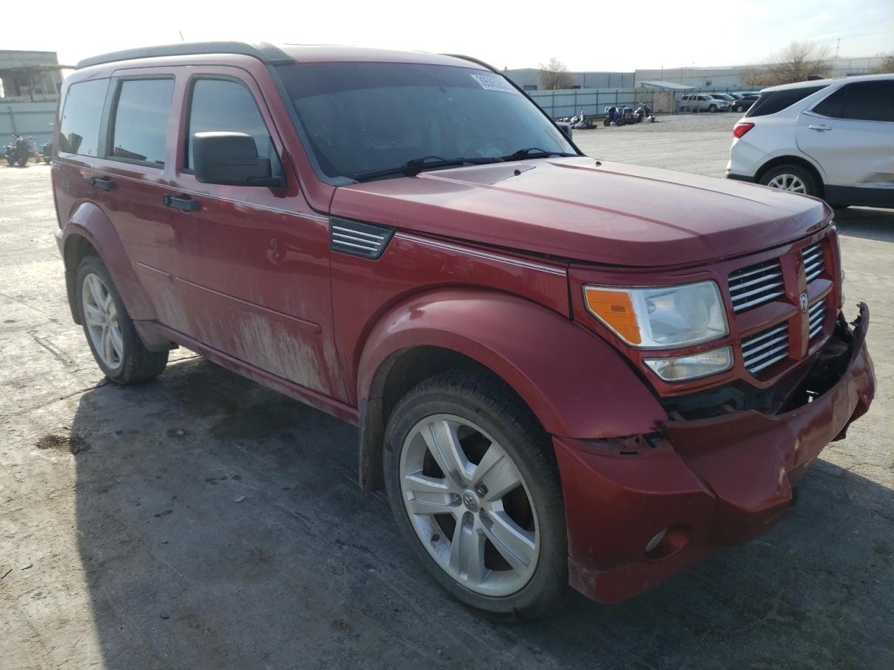 DODGE NITRO SHOC 2010 with VIN 1D4PU7GX3AW163578 - Photo from auction