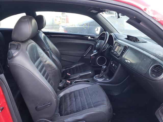 Photo 5 from auction – 2014 VOLKSWAGEN BEETLE TUR with VIN 3VWVS7AT3EM620750