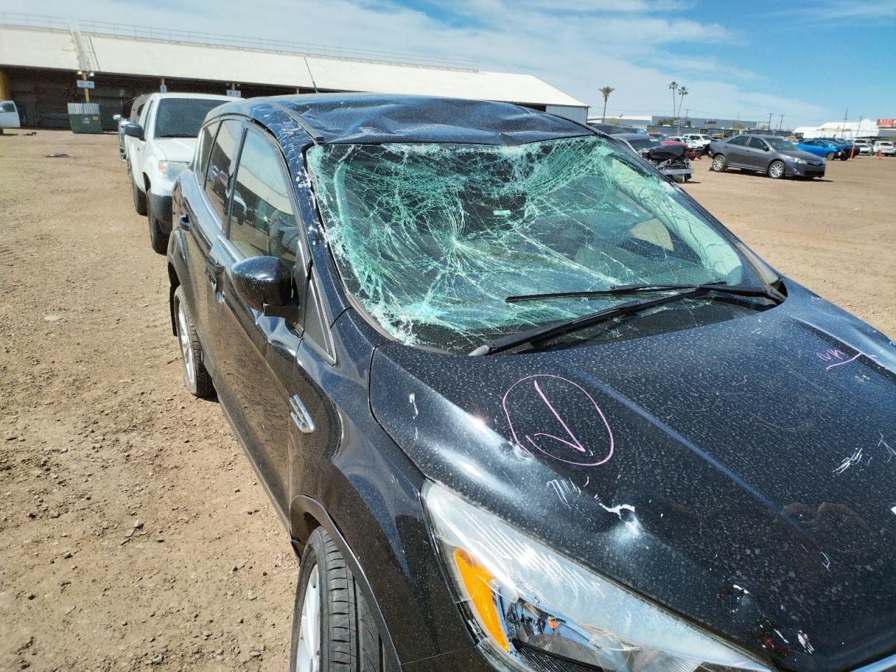 Photo 9 from auction – 2017 FORD ESCAPE SE with VIN 1FMCU9G99HUF11085