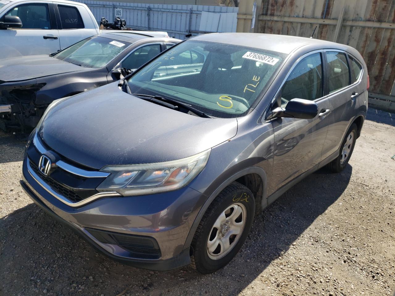 Photo 2 from auction – 2015 HONDA CR-V LX with VIN 3CZRM3H31FG706971