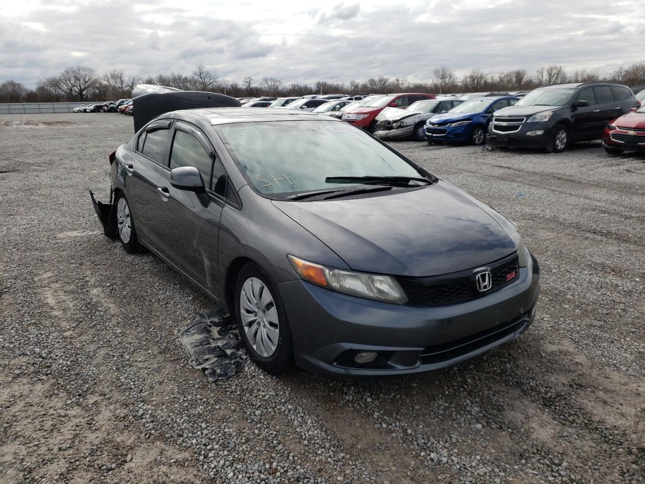 HONDA CIVIC SI 2012 with VIN 2HGFB6E5XCH700329 - Photo from auction