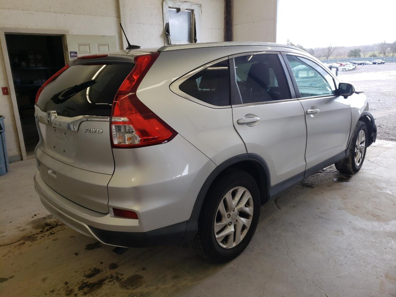 Photo 4 from auction – 2015 HONDA CR-V EXL with VIN 2HKRM4H79FH665611