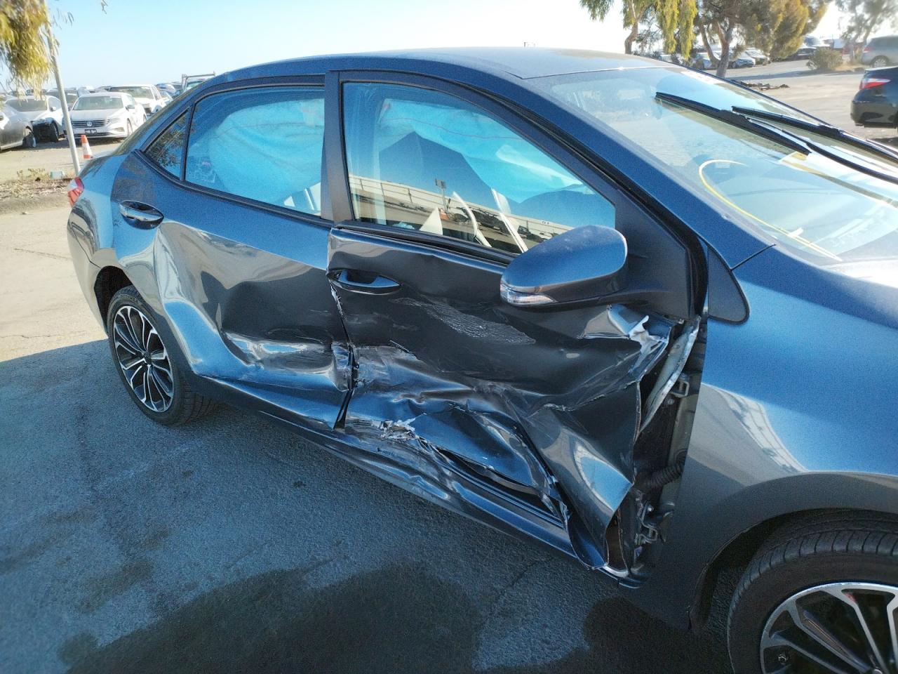 Photo 9 from auction – 2016 TOYOTA COROLLA L with VIN 5YFBURHE5GP557018