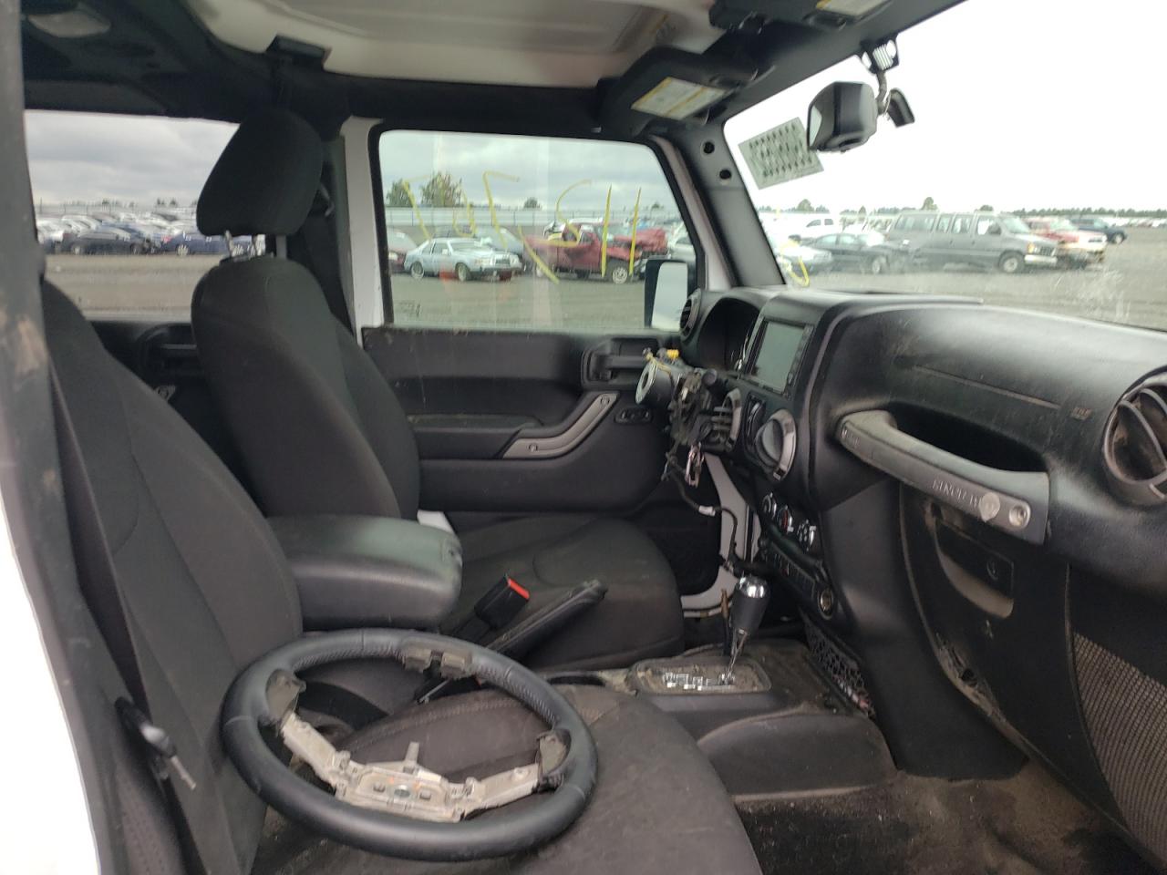 Photo 5 from auction – 2015 JEEP WRANGLER U with VIN 1C4BJWDG7FL730351
