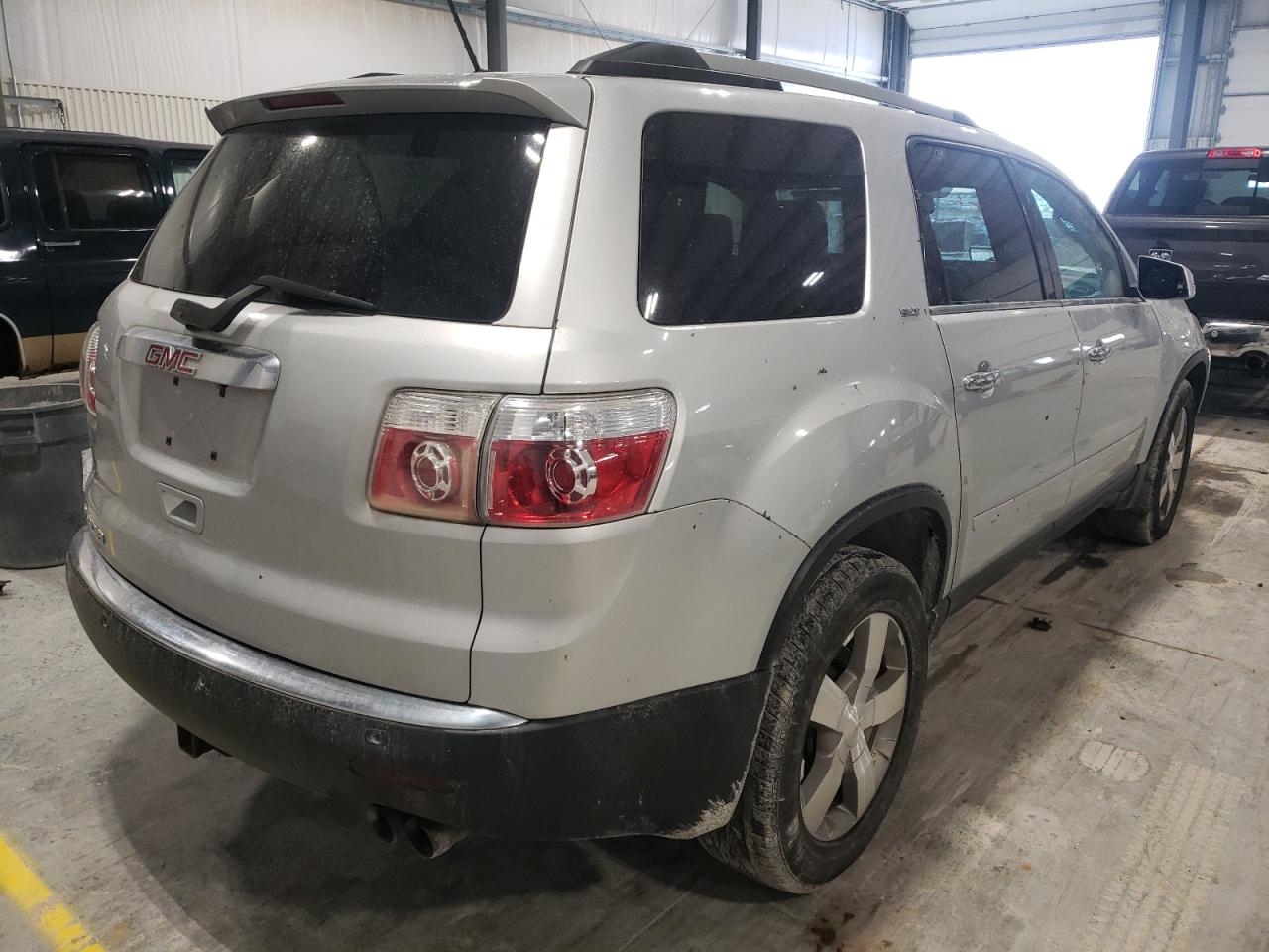 Photo 4 from auction – 2011 GMC ACADIA SLT with VIN 1GKKRRED2BJ353114
