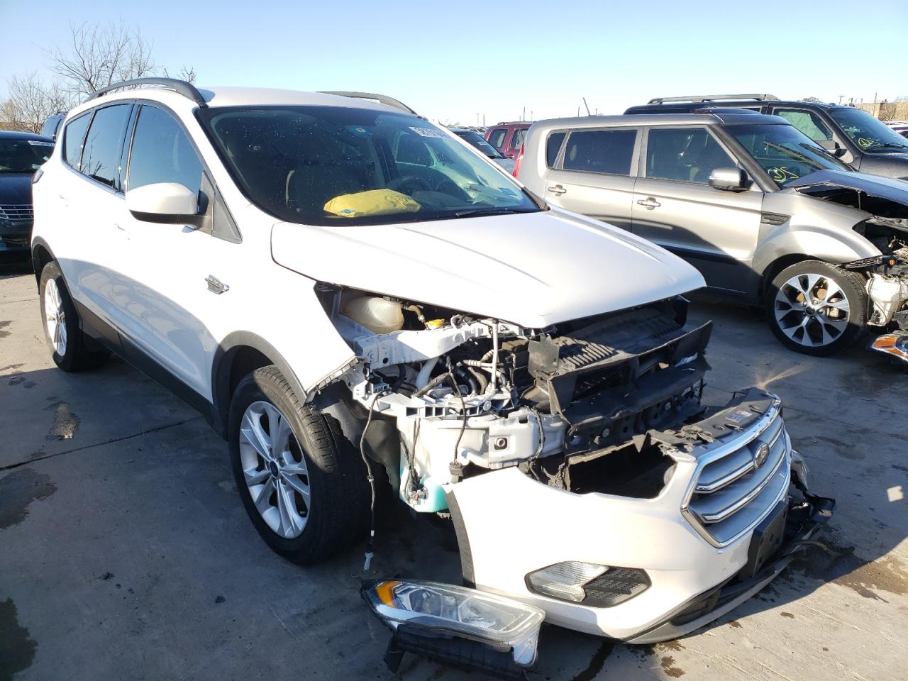 FORD ESCAPE SE 2017 with VIN 1FMCU0GD4HUE34707 - Photo from auction