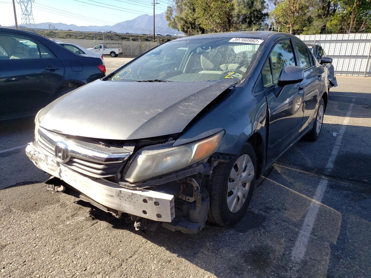 Photo 2 from auction – 2012 HONDA CIVIC LX with VIN 19XFB2F51CE370100