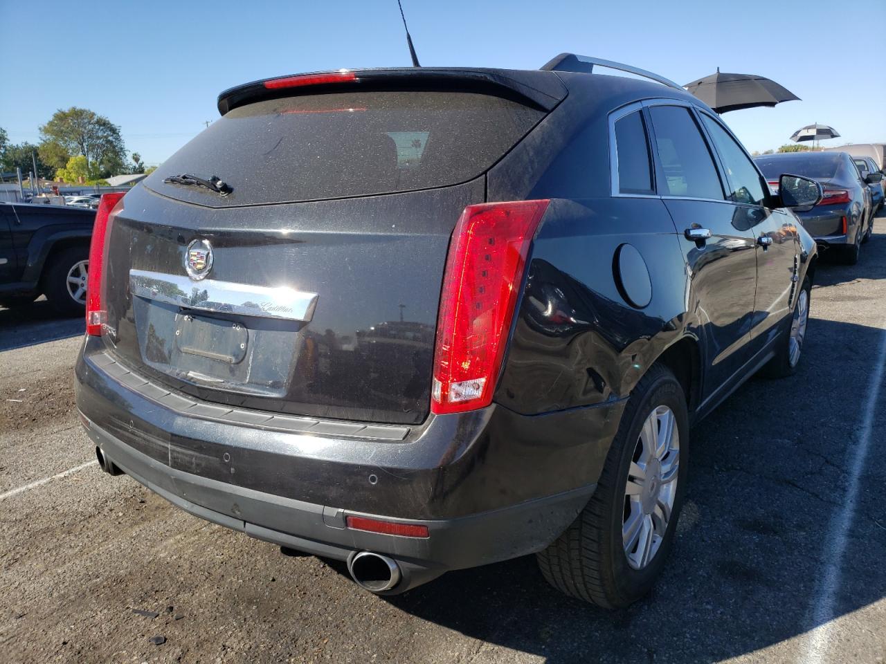 Photo 4 from auction – 2011 CADILLAC SRX LUXURY with VIN 3GYFNAEY8BS678873