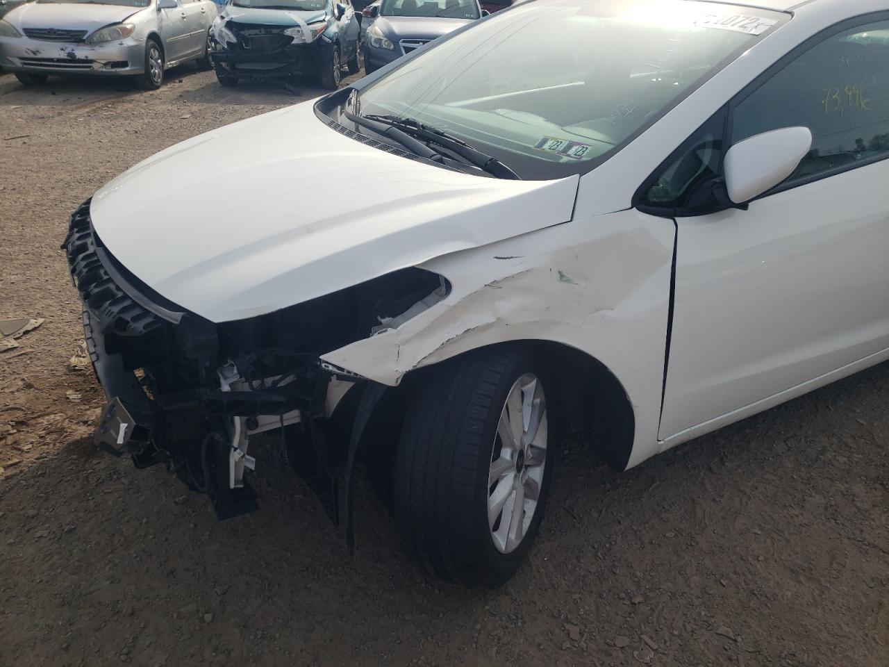 Photo 9 from auction – 2017 KIA FORTE LX with VIN 3KPFL4A75HE052943